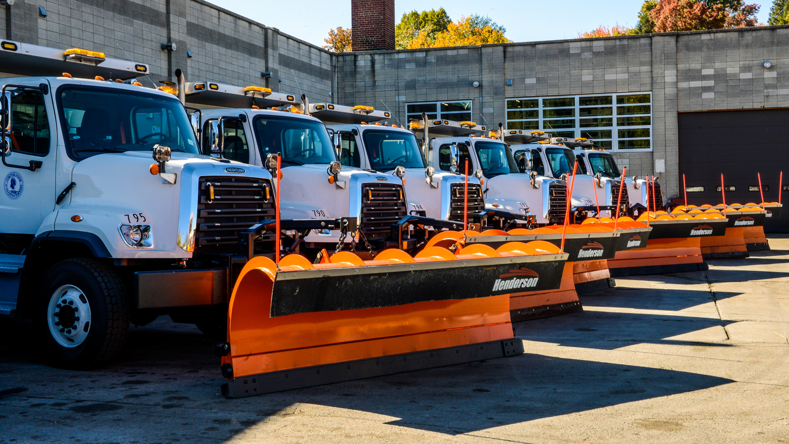 Fleet of snow plow trucks