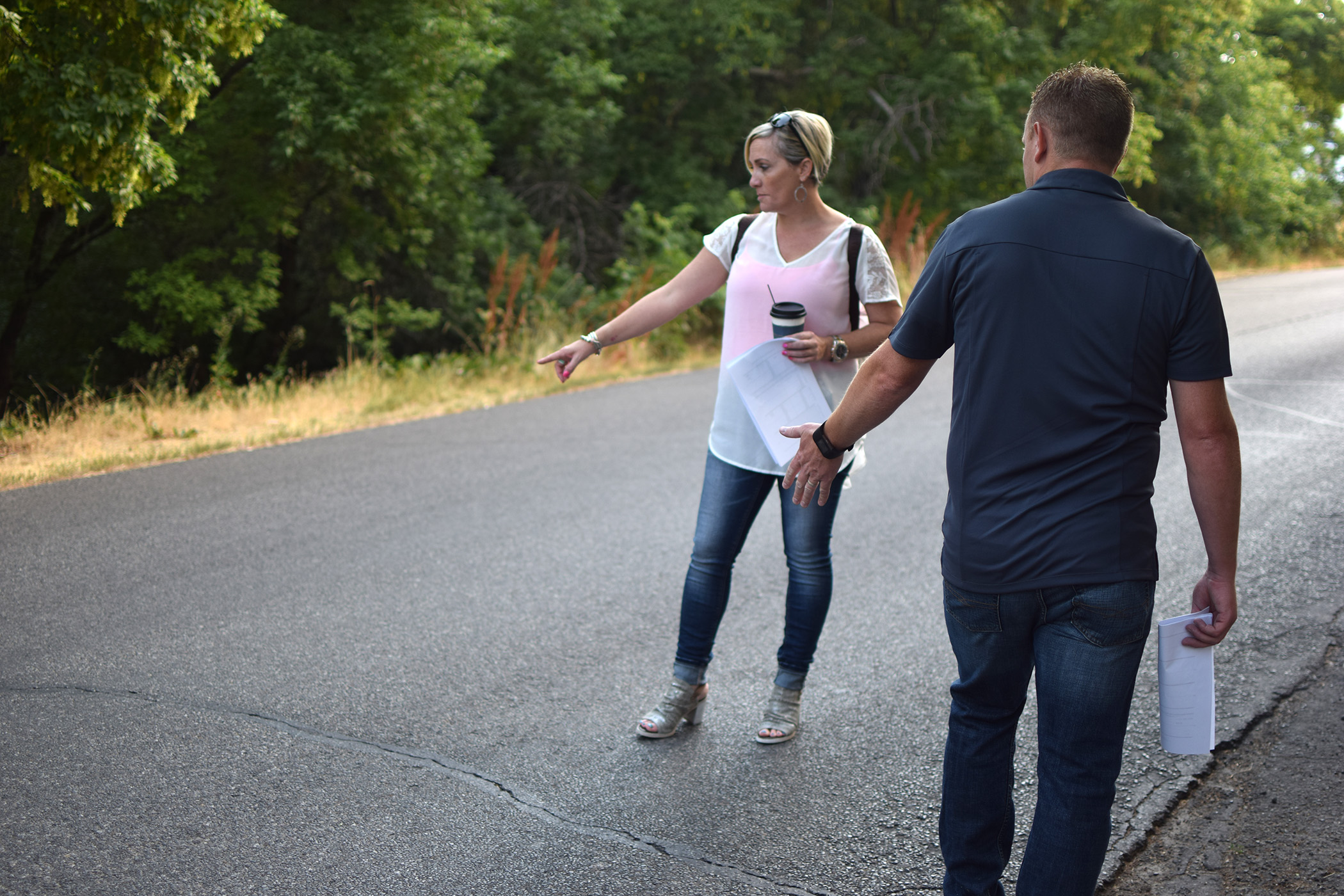 Woman completing a road assessment