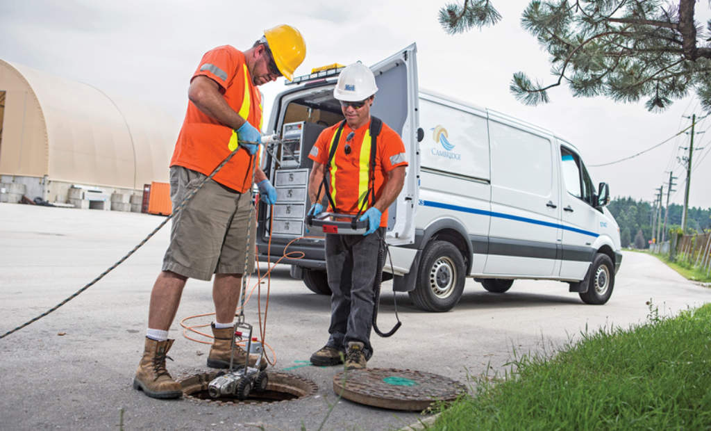 Workers checking out a sewer